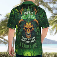 Green Hawaiian shirt back with skull, “CAN’T GO TO HELL” and “restraining order” text