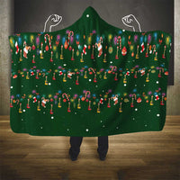 Ornaments on Green Snowy Background Hooded Blanket with Electric Guitars Santa Candy Canes - Wonder Print Shop