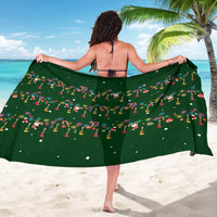 Ornaments on Green Snowy Background Sarong with Electric Guitars Santa Candy Canes - Wonder Print Shop