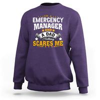 Purple crewneck sweatshirt with “Emergency Manager” dad graphic print