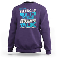 Purple crewneck sweatshirt with colorful 'Shutter Driver' 'That's how we talk' print