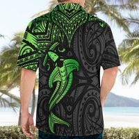 Back view of black and green Hawaiian shirt with hammerhead shark tribal pattern