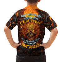 Black Hawaiian shirt with orange flames and back slogan around skull graphic.
