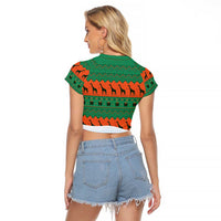 Giraffes Decorating Tree Gifts Raglan Cropped T Shirt with Orange Green Holiday Pattern Design - Wonder Print Shop