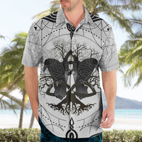 White short-sleeve Hawaiian shirt with black raven emblem graphic and open collar