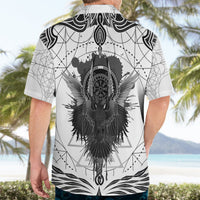 White short-sleeve Hawaiian shirt with large black raven-wing crest on the back