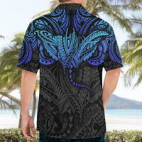 Back view of black Hawaiian button-up with blue polynesian ray pattern, short sleeves, collar