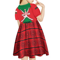 Oman Kid Short Sleeve Dress with National Flag Colors and Crossed Khanjar Emblem Design