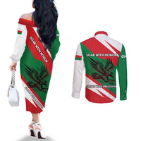 Oman Couples Matching Off The Shoulder Long Sleeve Dress and Long Sleeve Button Shirt with National Flag Colors and Falcon Soaring Graphic Design