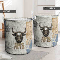 Apis Ancient Egyptian Laundry Basket with Beige-Gray Hieroglyphic, Ornate Bull Head, and Gold-Blue Typography - Wonder Print Shop