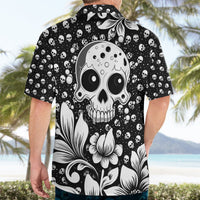 Black Hawaiian shirt with large skull graphic and white lilies print, button-up collar
