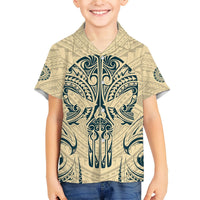 Kids tan Hawaiian shirt with blue tribal skull front print, camp collar, short sleeves