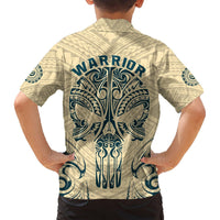 Kids tan Hawaiian shirt with blue warrior text and tribal skull back print, short sleeves