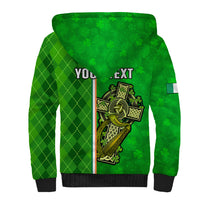Green sherpa hoodie back with argyle pattern, shamrock cross graphic, text 'YOU NEXT'