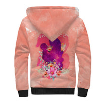Sherpa-lined pink hoodie with purple floral heart graphic and flower bouquet on back