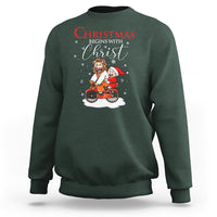 Christmas Begins With Christ Jesus Santa Riding Bicycle Sweatshirt - Wonder Print Shop