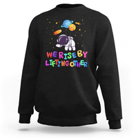 We Rise By Lifting Other Outer Space Astronaut Planet Balloon Motivational Quote Sweatshirt - Wonder Print Shop