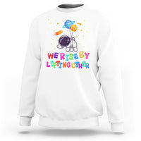 We Rise By Lifting Other Outer Space Astronaut Planet Balloon Motivational Quote Sweatshirt - Wonder Print Shop