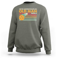 Funny Pickleball Sweatshirt Never Underestimate An Old Man With A Pickleball Paddle - Wonder Print Shop