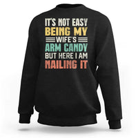 Funny Husband Sweatshirt It's Not Easy Being My Wife's Arm Candy - Wonder Print Shop