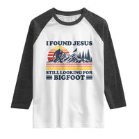 Retro I Found Jesus Still Looking Bigfoot Raglan Shirt Funny Sasquatch Bigfoot Believer Christian Humor