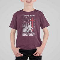 Retro I Found Jesus Still Looking For Bigfoot T Shirt For Kid Camouflage US American Flag Camo
