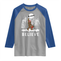 Bigfoot Christmas Tree Lights Raglan Shirt Believe Rock On Sasquatch Santa Hat