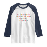 Be The Reason Someone Believes Recovery Is Possible Graphic Raglan Shirt
