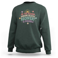 Be The Reason Someone Believes Recovery Is Possible Graphic Sweatshirt Groovy Graphic