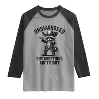 Undiagnosed But Something Ain't Right Raglan Shirt Funny Raccoon Cowboy