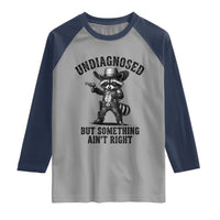 Undiagnosed But Something Ain't Right Raglan Shirt Funny Raccoon Cowboy