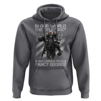 Combat Medic Hoodie In Our World The Title Doc Is Not Earned Form A Fancy Degree - Wonder Print Shop