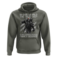 Combat Medic Hoodie In Our World The Title Doc Is Not Earned Form A Fancy Degree - Wonder Print Shop