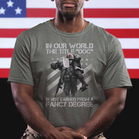 Combat Medic T Shirt In Our World The Title Doc Is Not Earned Form A Fancy Degree - Wonder Print Shop