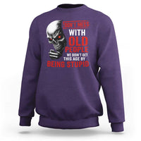 Funny Dont Mess With Old People We Didnt Get This Age By Being Stupid Sweatshirt Vintage Skull - Wonder Print Shop
