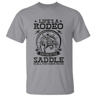 Western Cowboy T Shirt Life's A Rodeo Staying In The Saddle Is All You Have To Do - Wonder Print Shop