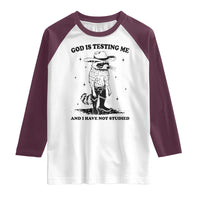 Funny God Is Testing Me And I Have Not Studied Raglan Shirt Cowboy Racoon