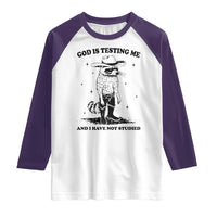 Funny God Is Testing Me And I Have Not Studied Raglan Shirt Cowboy Racoon