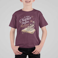 A New Chapter Begins Retired 2026 T Shirt For Kid Retired Teacher Floral Book - Wonder Print Shop