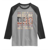 Funny Just A Regular Dad Trying Not To Raise Liberals Raglan Shirt Fathers Day