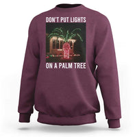 Funny Christmas Dont Put Lights On A Palm Tree Sweatshirt Xmas Lights Palm Tree Meme - Wonder Print Shop