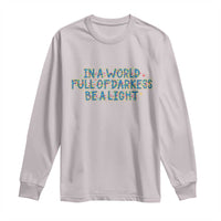 In A World Full Of Darkness Be A Light Long Sleeve Shirt Christmas Quote Gift - Wonder Print Shop