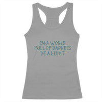 In A World Full Of Darkness Be A Light Racerback Tank Top Christmas Quote Gift - Wonder Print Shop