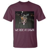 We Ride at Dawn T Shirt Funny Racoon Riding Tricycle Chaotic Meme