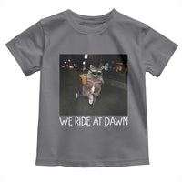 We Ride at Dawn Toddler T Shirt Funny Racoon Riding Tricycle Chaotic Meme