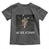 We Ride at Dawn Toddler T Shirt Funny Racoon Riding Tricycle Chaotic Meme