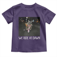 We Ride at Dawn Toddler T Shirt Funny Racoon Riding Tricycle Chaotic Meme