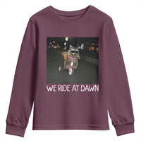 We Ride at Dawn Youth Sweatshirt Funny Racoon Riding Tricycle Chaotic Meme