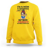 Funny Retirement Sweatshirt I Am A Mom And A Grandma And A Retired Nurse Nothing Scares Me - Wonder Print Shop