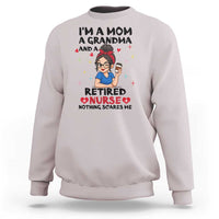 Funny Retirement Sweatshirt I Am A Mom And A Grandma And A Retired Nurse Nothing Scares Me - Wonder Print Shop